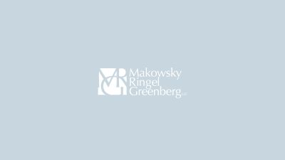 MRG logo on a light blue background