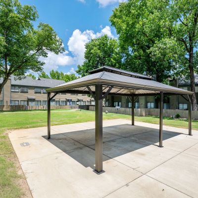 Alternative view of the covered metal gazebo canopy set against a backdrop of community townhome residences at The Birches Townhomes in South Memphis.