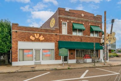 Sun Studio in Memphis, TN on a bright day with a few puffy clouds.