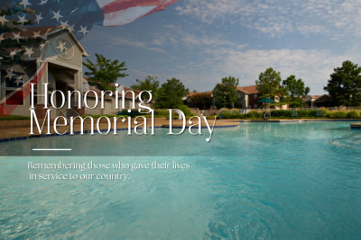 Memorial Day tribute banner featuring an American flag graphic overlaid on an apartment community swimming pool.