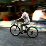 a guy riding a bike