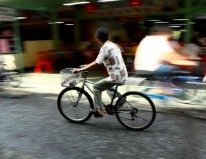 a guy riding a bike