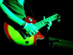 a guy playing guitar